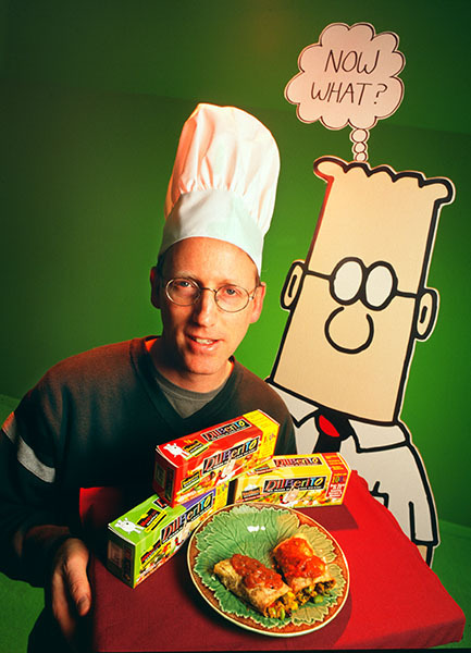 Scott Adams presenting the new "Dilburito", for Newsweek
