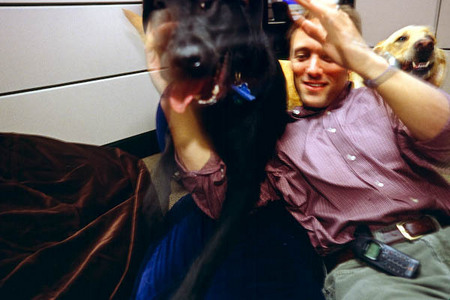CEO, Doug Merritt romps with his dogs